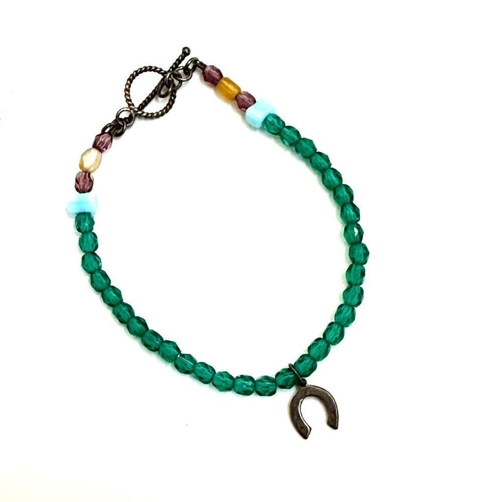 Sterling silver horseshoe charm green beaded bracelet